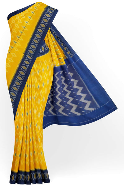 Handwoven ikat pure cotton saree in yellow .