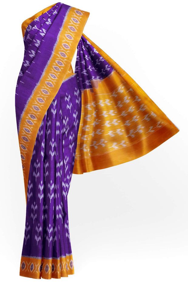 Handwoven ikat pure cotton saree in violet  with floral motifs .