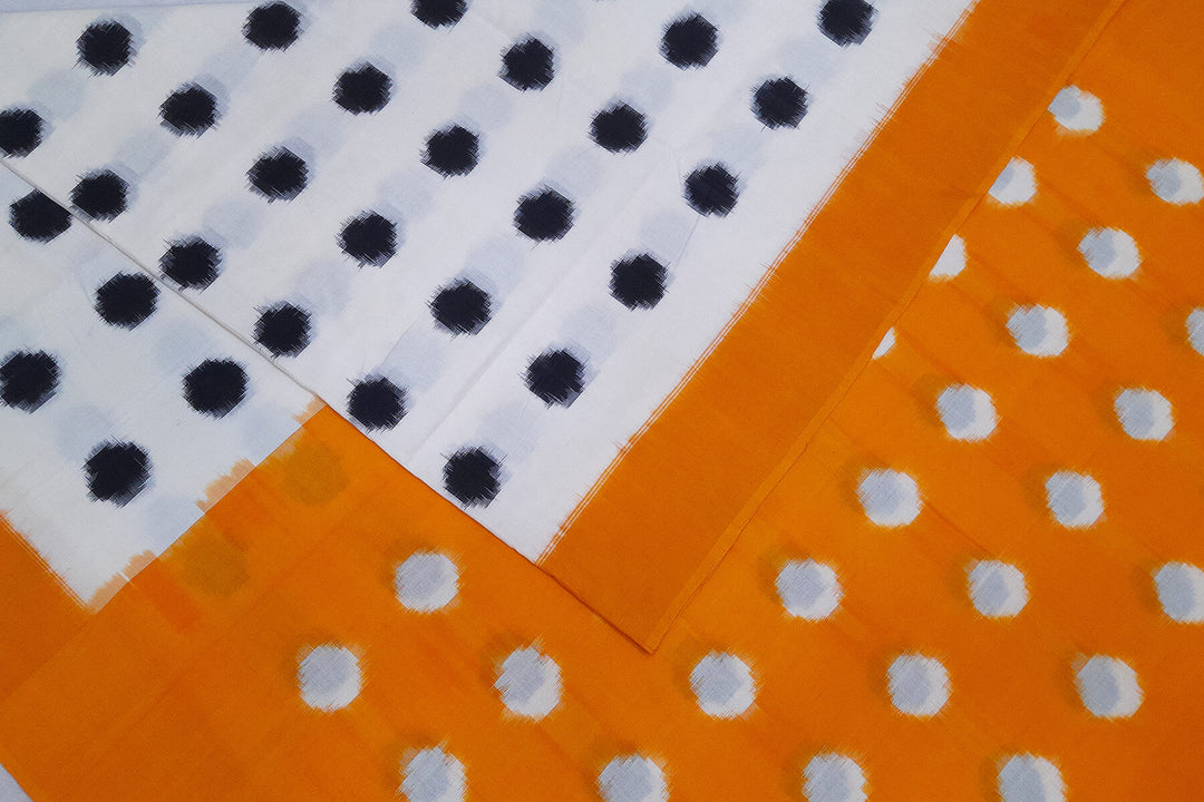 Handwoven double Ikat pure cotton saree in  off white