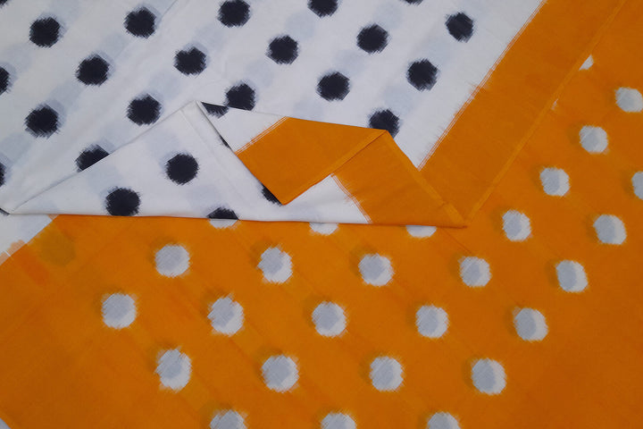 Handwoven double Ikat pure cotton saree in  off white