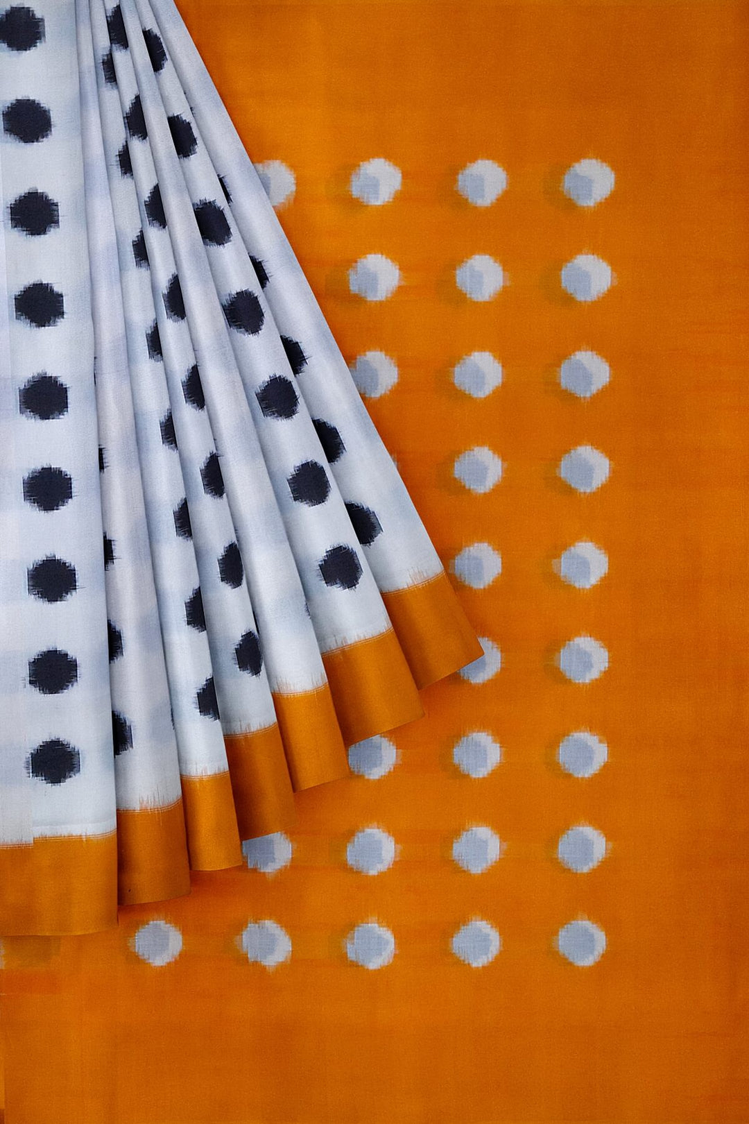 Handwoven double Ikat pure cotton saree in  off white