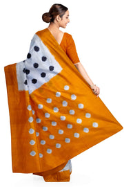 Handwoven double Ikat pure cotton saree in  off white with polka dots.