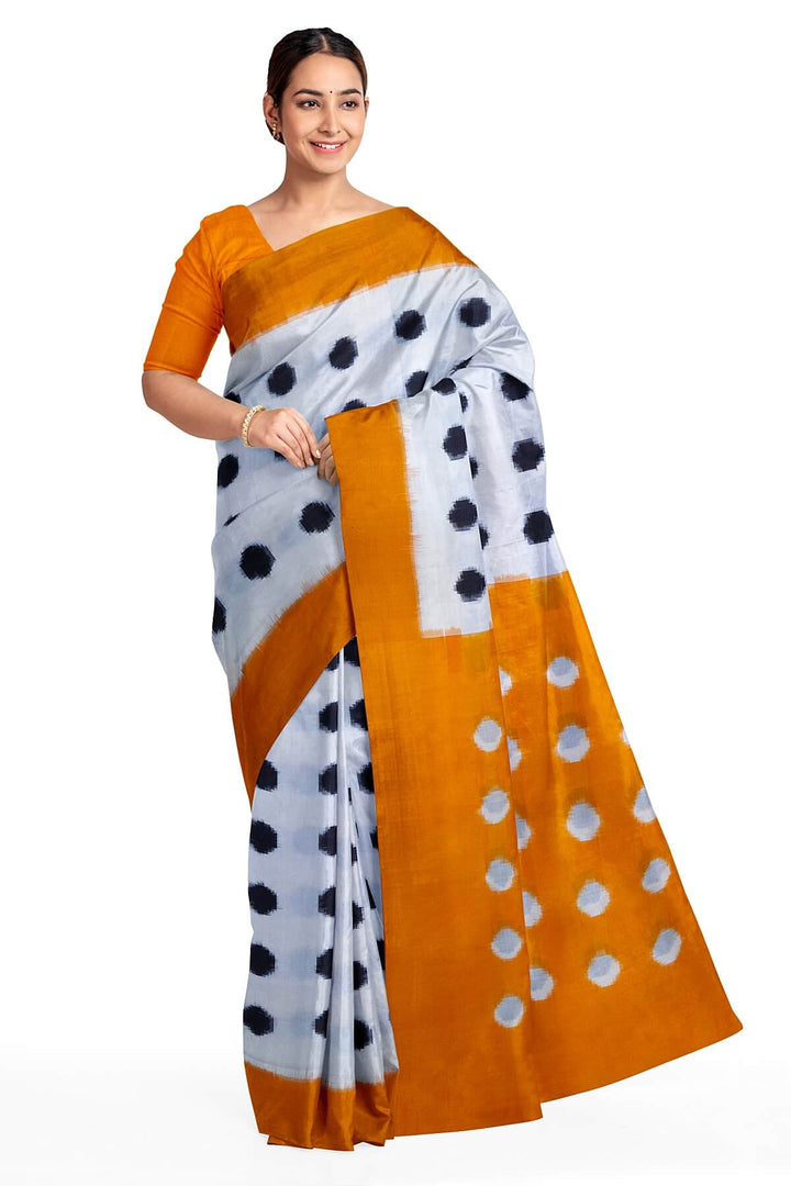 Handwoven double Ikat pure cotton saree in  off white