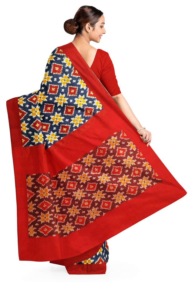 Handwoven double Ikat telia pure cotton saree in blue base with four motifs and a contrast pallu in maroon.