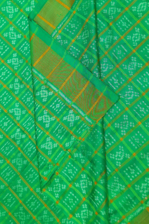 Handwoven Ikat pure silk fabric in zari checks with border