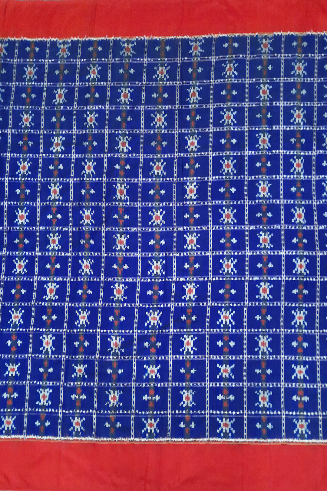 Handwoven Ikat pure silk fabric in blue with red border