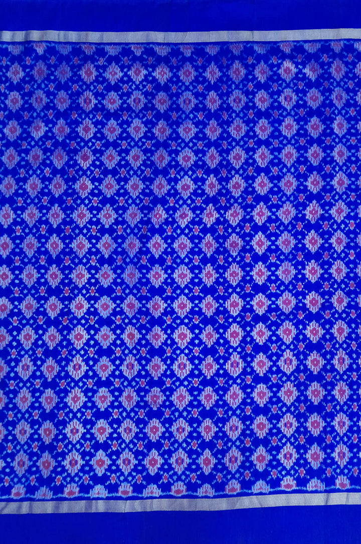 Handwoven Ikat pure silk fabric in diamond pattern in blue with border