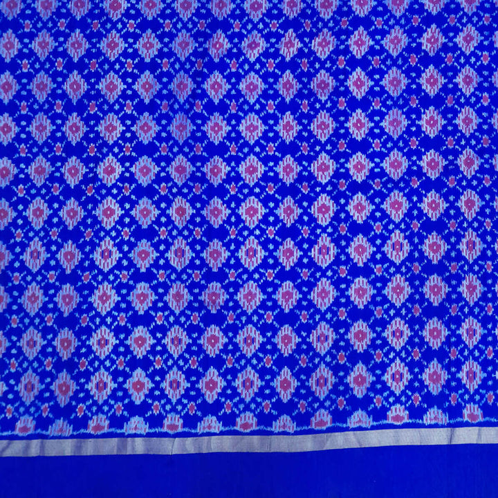 Handwoven Ikat pure silk fabric in diamond pattern in blue with border