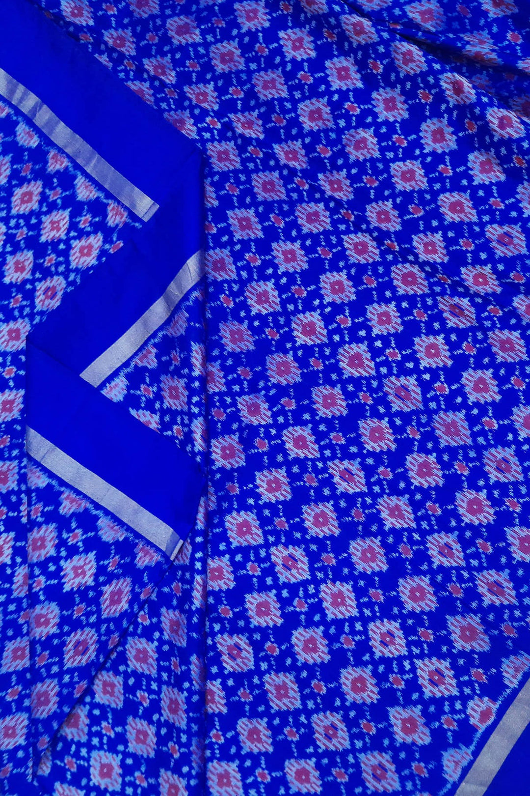 Handwoven Ikat pure silk fabric in diamond pattern in blue with border