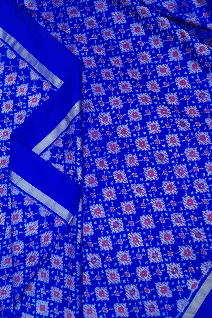 Handwoven Ikat pure silk fabric in diamond pattern in blue with border
