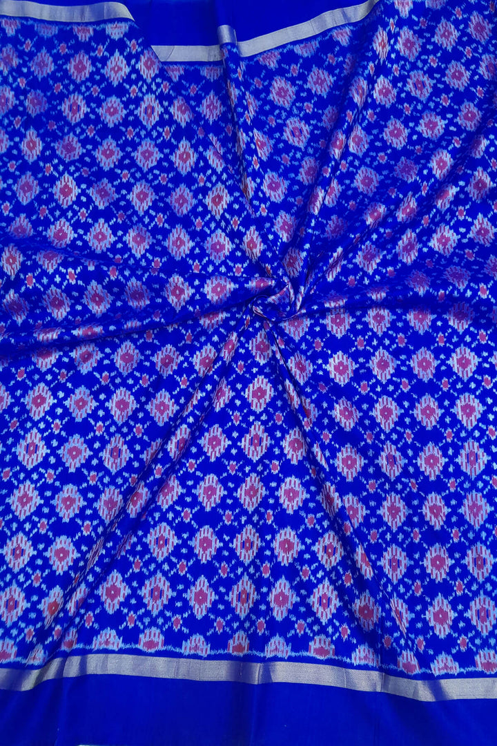 Handwoven Ikat pure silk fabric in diamond pattern in blue with border