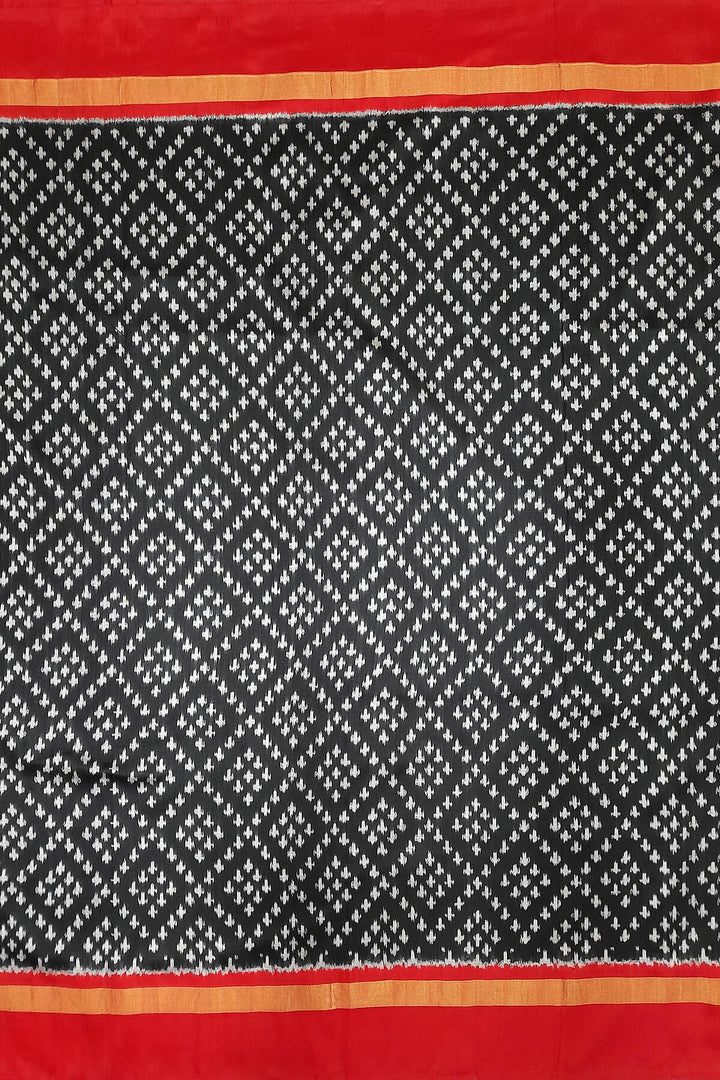 Handwoven Ikat pure silk fabric in black in geometric pattern with border