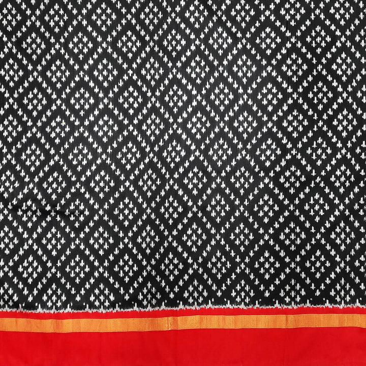 Handwoven Ikat pure silk fabric in black in geometric pattern with border