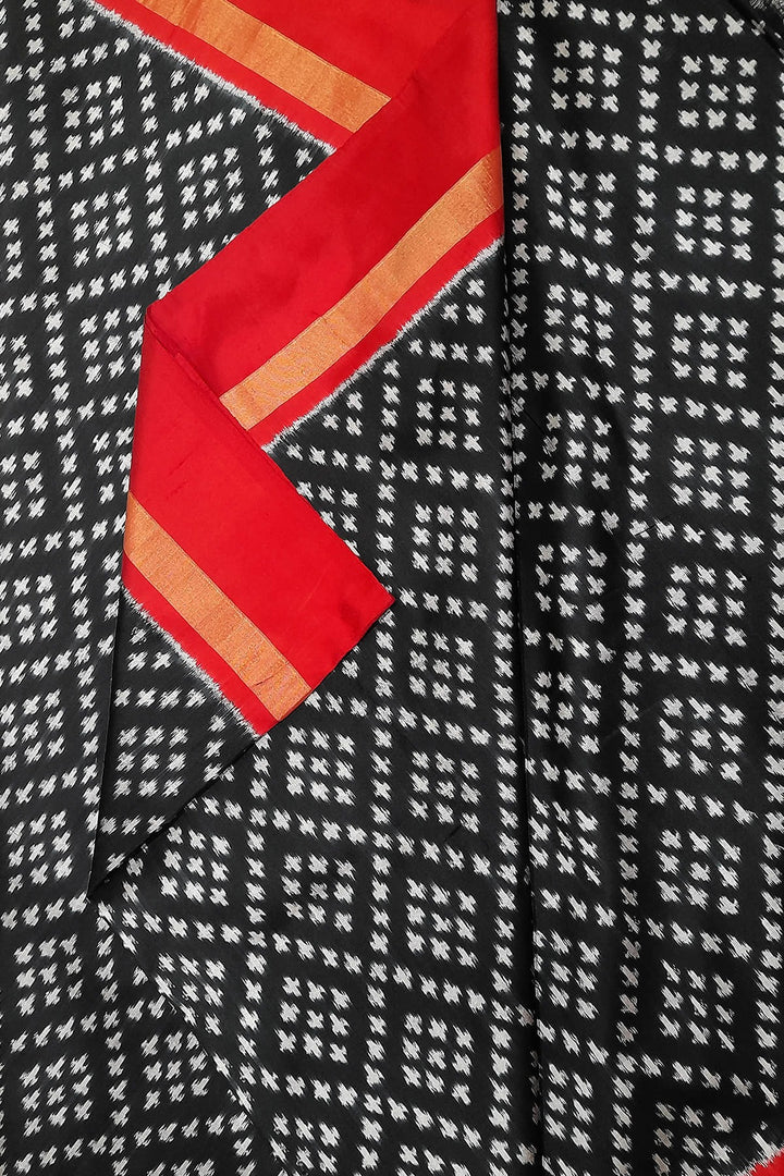Handwoven Ikat pure silk fabric in black in geometric pattern with border