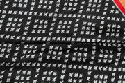 Handwoven Ikat pure silk fabric in black in geometric pattern with border