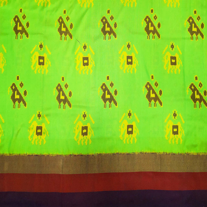 Handwoven Ikat pure silk fabric in green with elephant & bird motifs and red border