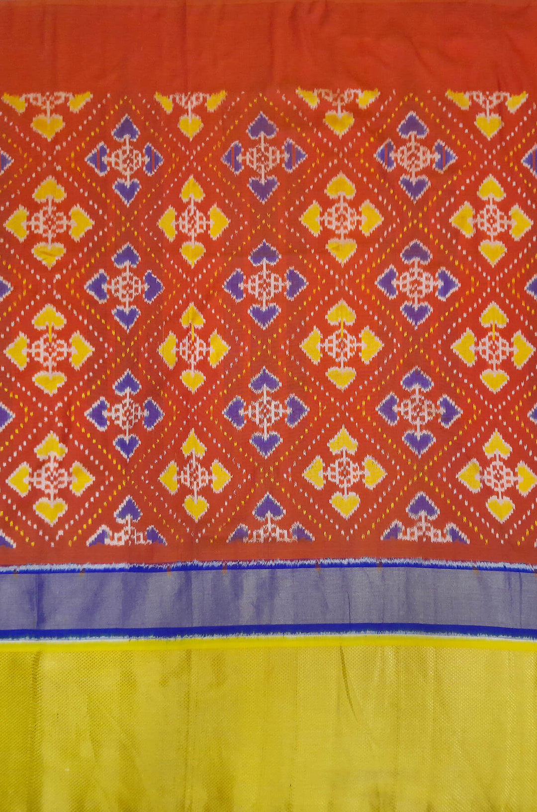 Handwoven Ikat pure silk fabric  in patola pattern in red with multicoloured border