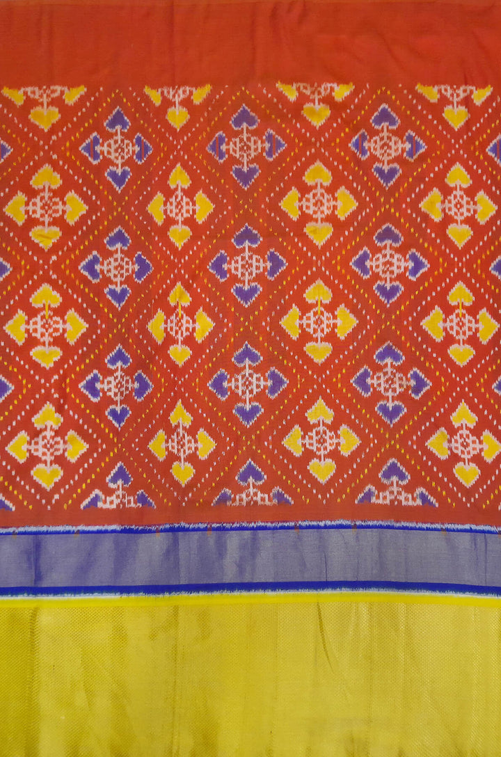 Handwoven Ikat pure silk fabric  in patola pattern in red with multicoloured border