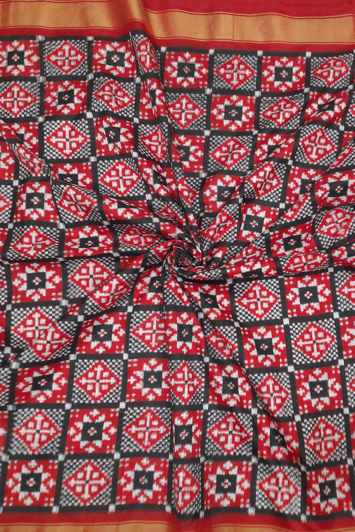 Handwoven Double Ikat pure silk fabric in geometric pattern in black checks with border