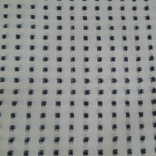Handwoven double ikat pure cotton fabric in off white with black squares