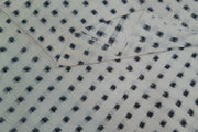 Handwoven double ikat pure cotton fabric in off white with black squares