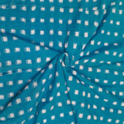 Handwoven double ikat pure cotton fabric in blue with white squares