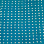 Handwoven double ikat pure cotton fabric in blue with white squares