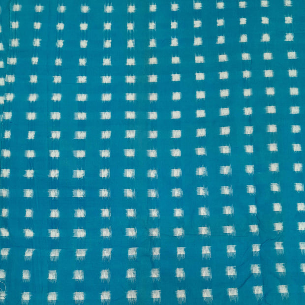 Handwoven double ikat pure cotton fabric in blue with white squares