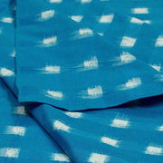 Handwoven double ikat pure cotton fabric in blue with white squares