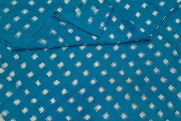 Handwoven double ikat pure cotton fabric in blue with white squares