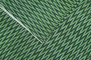 Handwoven ikat  pure cotton fabric in green in zig zag pattern