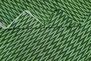 Handwoven ikat  pure cotton fabric in green in zig zag pattern