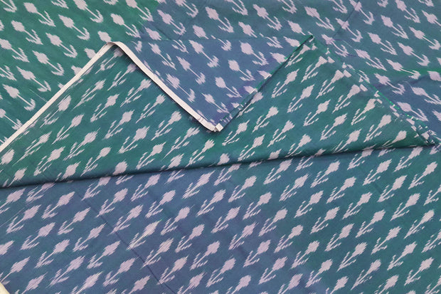 Handwoven ikat  pure cotton fabric in teal blue