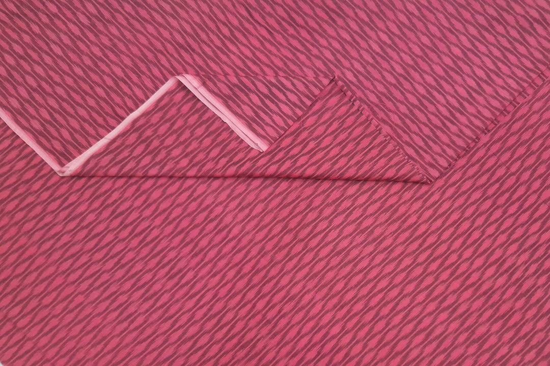 Handwoven ikat  pure cotton fabric in rust colour