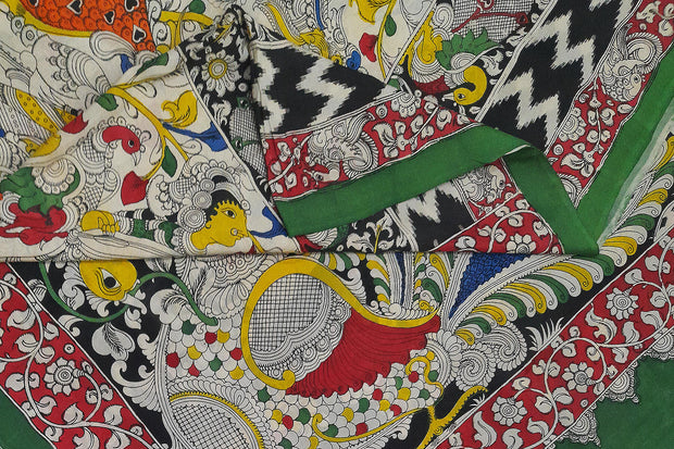 Hand drawn hand painted pen kalamkari silk cotton saree with peacock motif in pallu