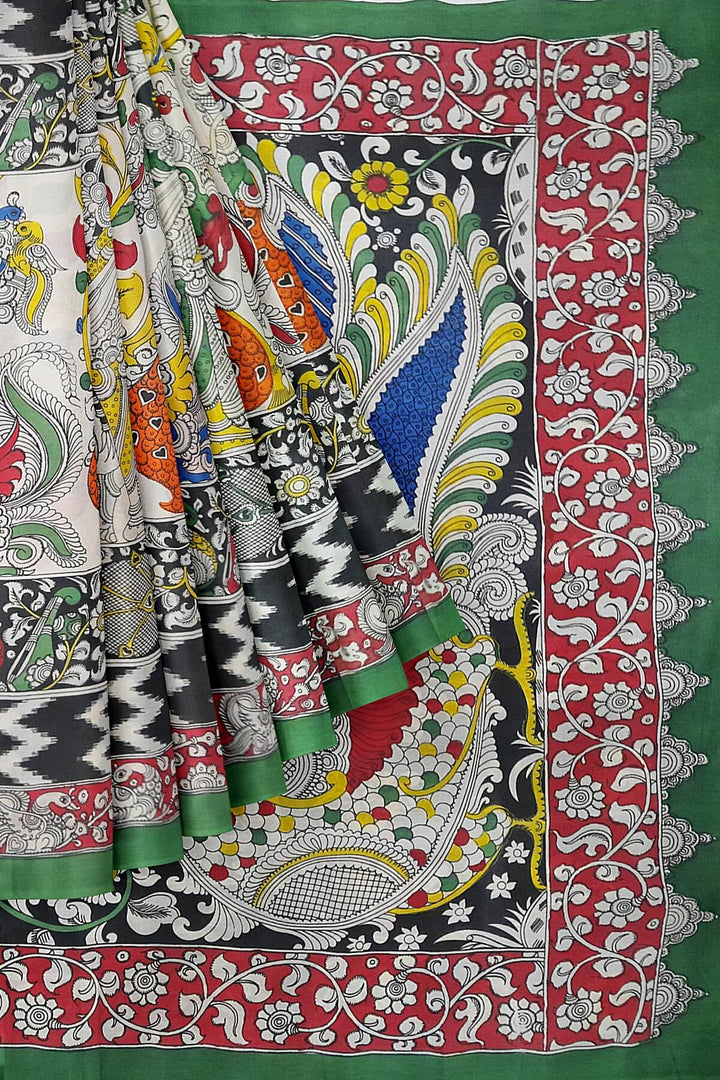 Hand drawn hand painted pen kalamkari silk cotton saree with peacock motif in pallu