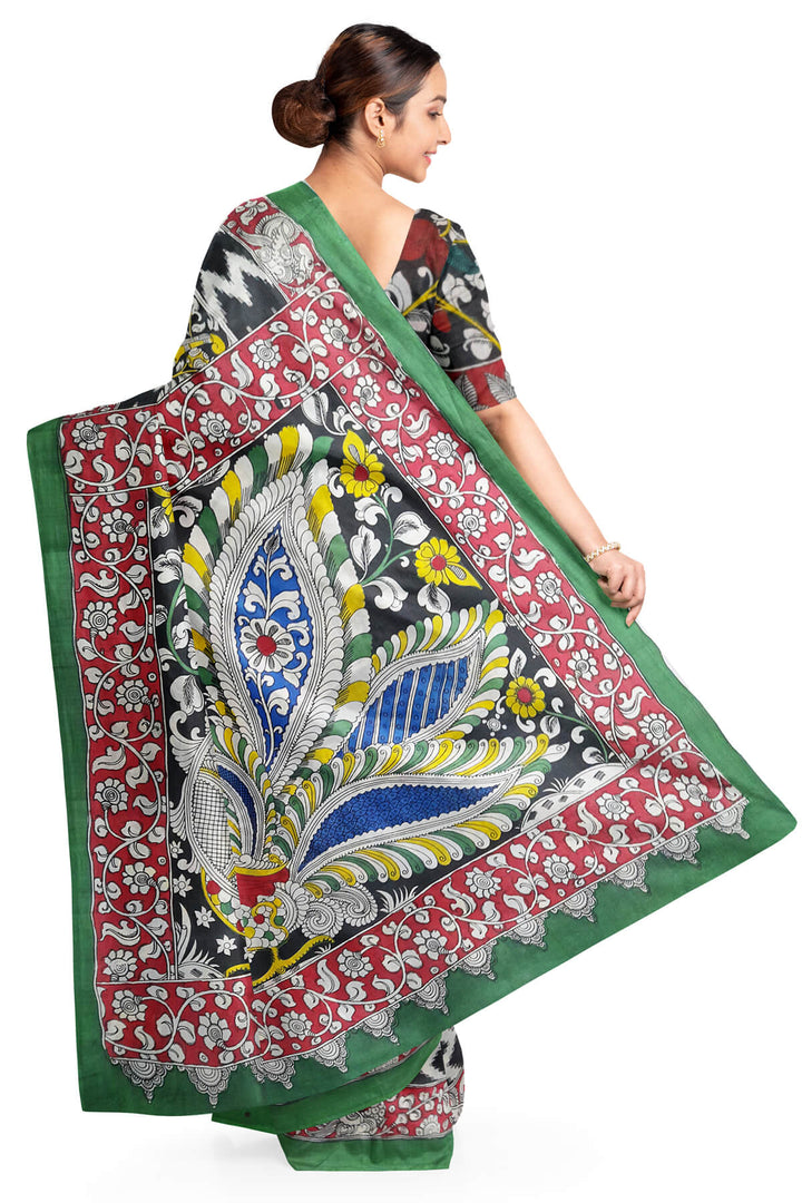 Hand drawn hand painted pen kalamkari silk cotton saree with peacock motif in pallu