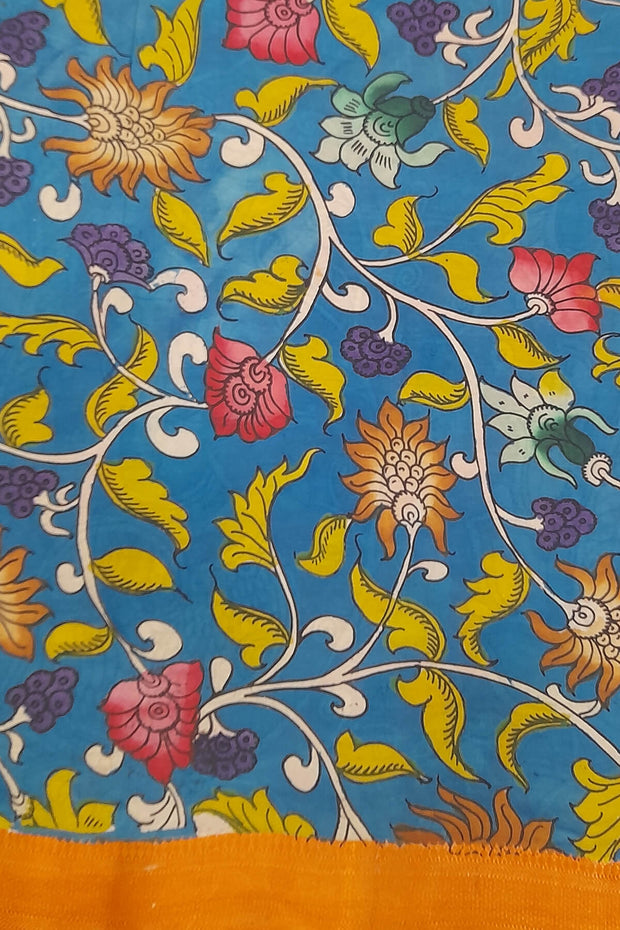 Hand painted Kalamkari on Bangalore silk saree in red with peacocks, tulips & lotuses .