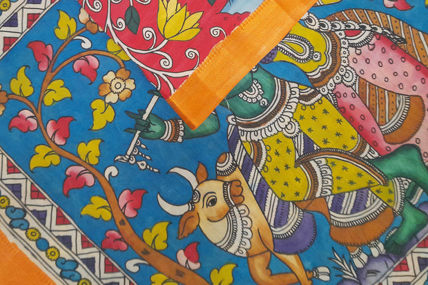 Hand painted Kalamkari on Bangalore silk saree in red with peacocks, tulips & lotuses .