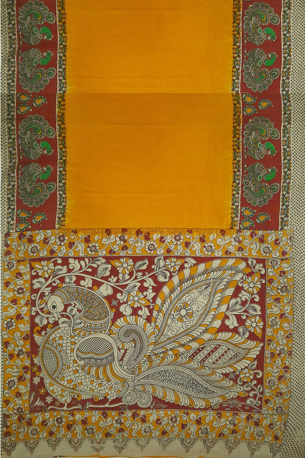 Printed Kalamkari pure cotton saree in yellow with peacock motif in pallu