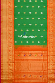 Handwoven Kanchi pure silk pure zari saree in green with gold & silver motifs