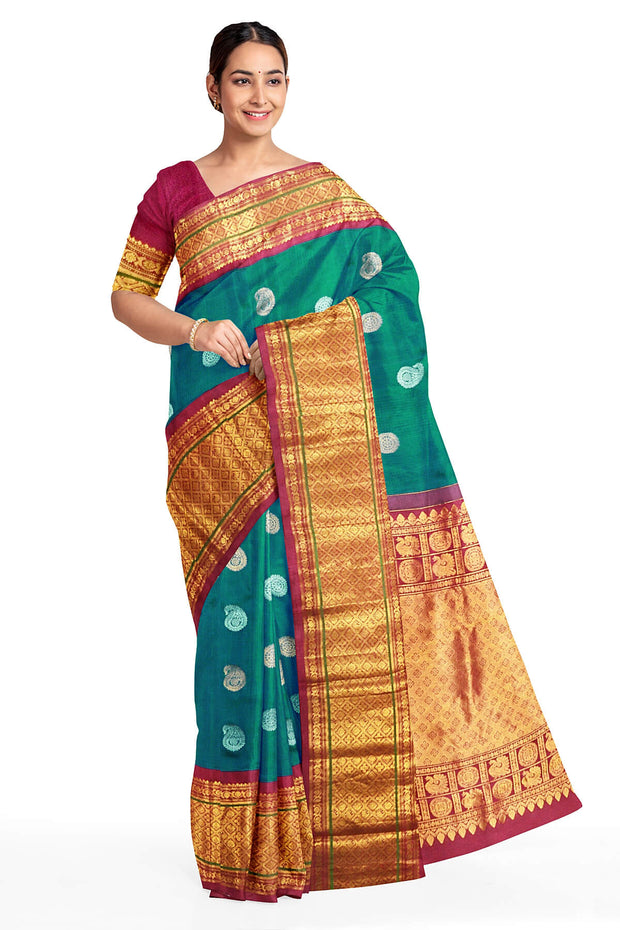 Handwoven Kanchi pure silk saree in dual tone blue with silver motifs.