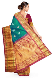 Handwoven Kanchi pure silk saree in dual tone blue with silver motifs.