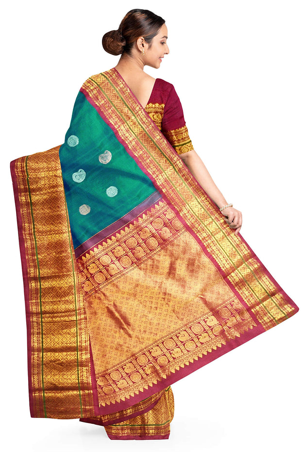 Handwoven Kanchi pure silk saree in dual tone blue with silver motifs.