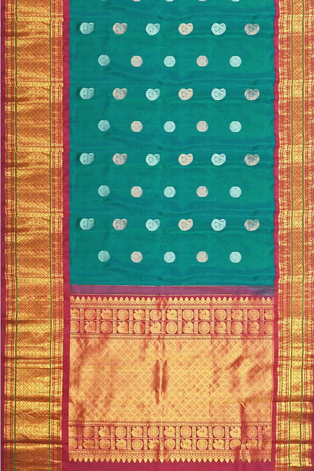 Handwoven Kanchi pure silk saree in dual tone blue with silver motifs.