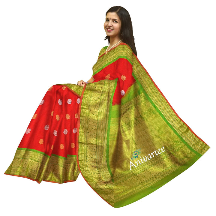 Handwoven Kanchi pure silk pure zari saree in red with peacock motifs in gold and silver