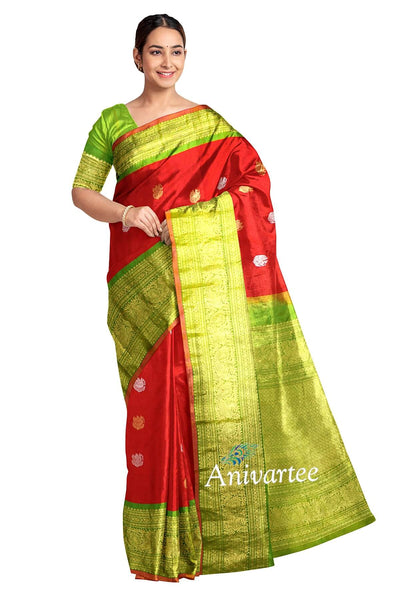 Handwoven Kanchi pure silk pure zari saree in red with peacock motifs in gold and silver