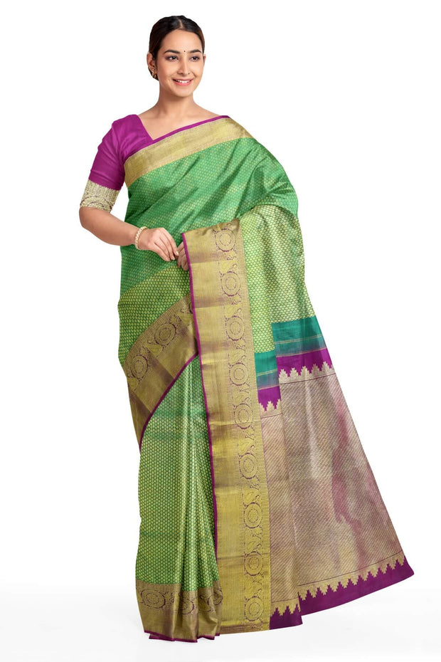 Handwoven Kanchi pure silk brocade saree in leaf green with pallu in pink