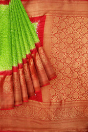 Bandhini pure silk saree in green with Kanchi patterned  border