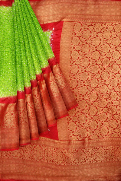 Bandhini pure silk saree in green with Kanchi patterned  border
